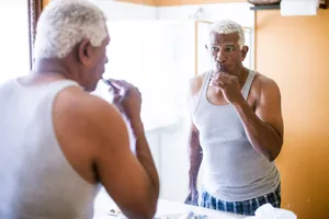 Brushing your teeth too hard is one of several things that can lead to sore gums. Photo Credit: adamkaz / Getty Images