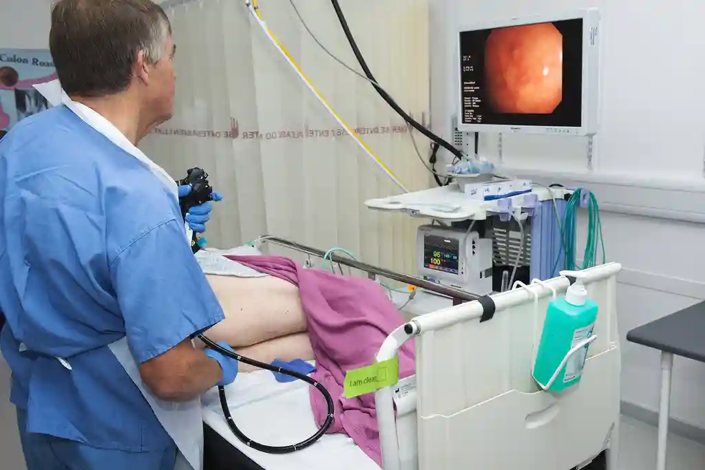 photo of gastroenterologist performing colonoscopy