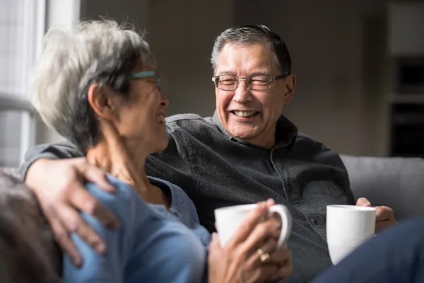 photo of mature couple drinking coffee