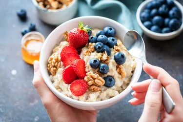 You can get fiber from lots of foods such as strawberries, blueberries, and oatmeal. (Photo credit: iStock/Getty Images)