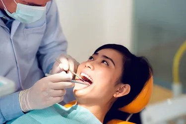 Regular dental checkups and cleanings can help you avoid the conditions that lead to tooth abscesses. (iStock/Getty Images)