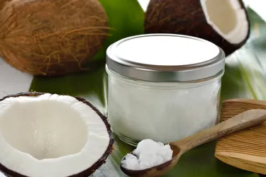 Coconut oil is used as a cooking fat and as a moisturizing ingredient in skin and hair care products. (Photo Credit: Geo-grafika/Getty Images)