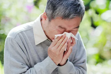 Sneezing and a runny nose are the most common symptoms of seasonal allergies. (Photo Credit: Getty Images)