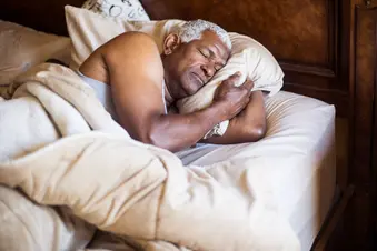 photo of  mature man sleeping