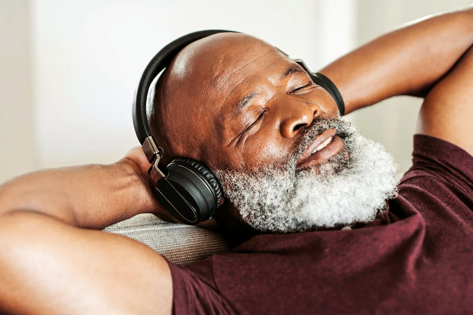 photo of Senior man listening to music