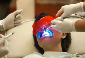 Woman Having Teeth Whitened