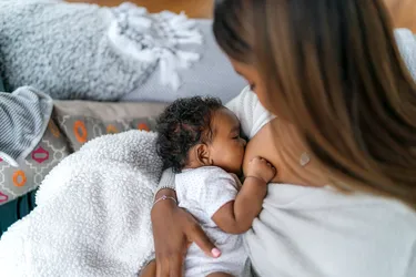 Nursing offers benefits for both you and your baby, but deciding to breastfeed is a personal choice that has to be right for you. (Photo credit: E+/Getty Images)